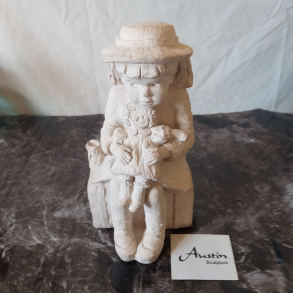 Austin Sculpture Girl Holding Doll